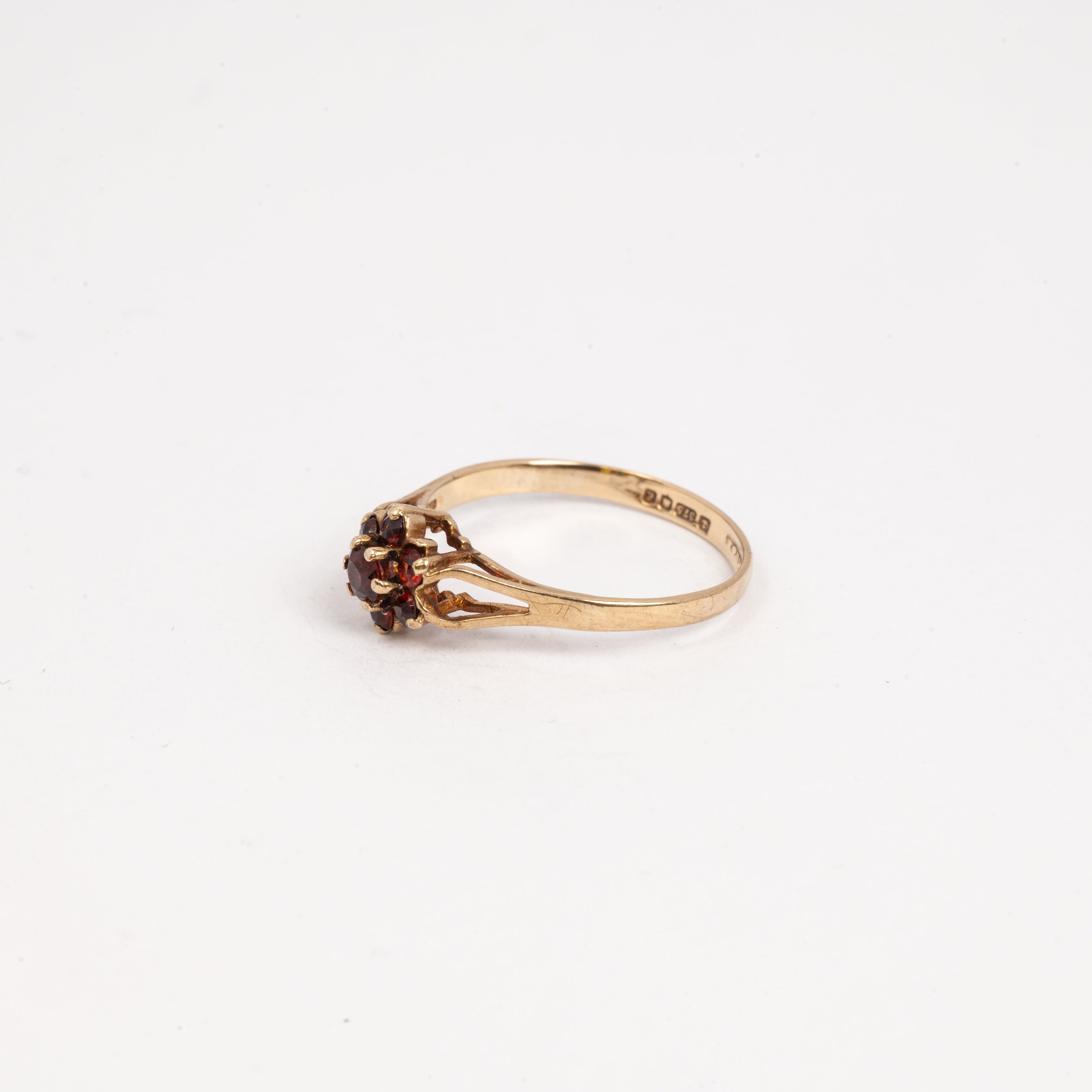 Ladies Small Garnet Flower Ring