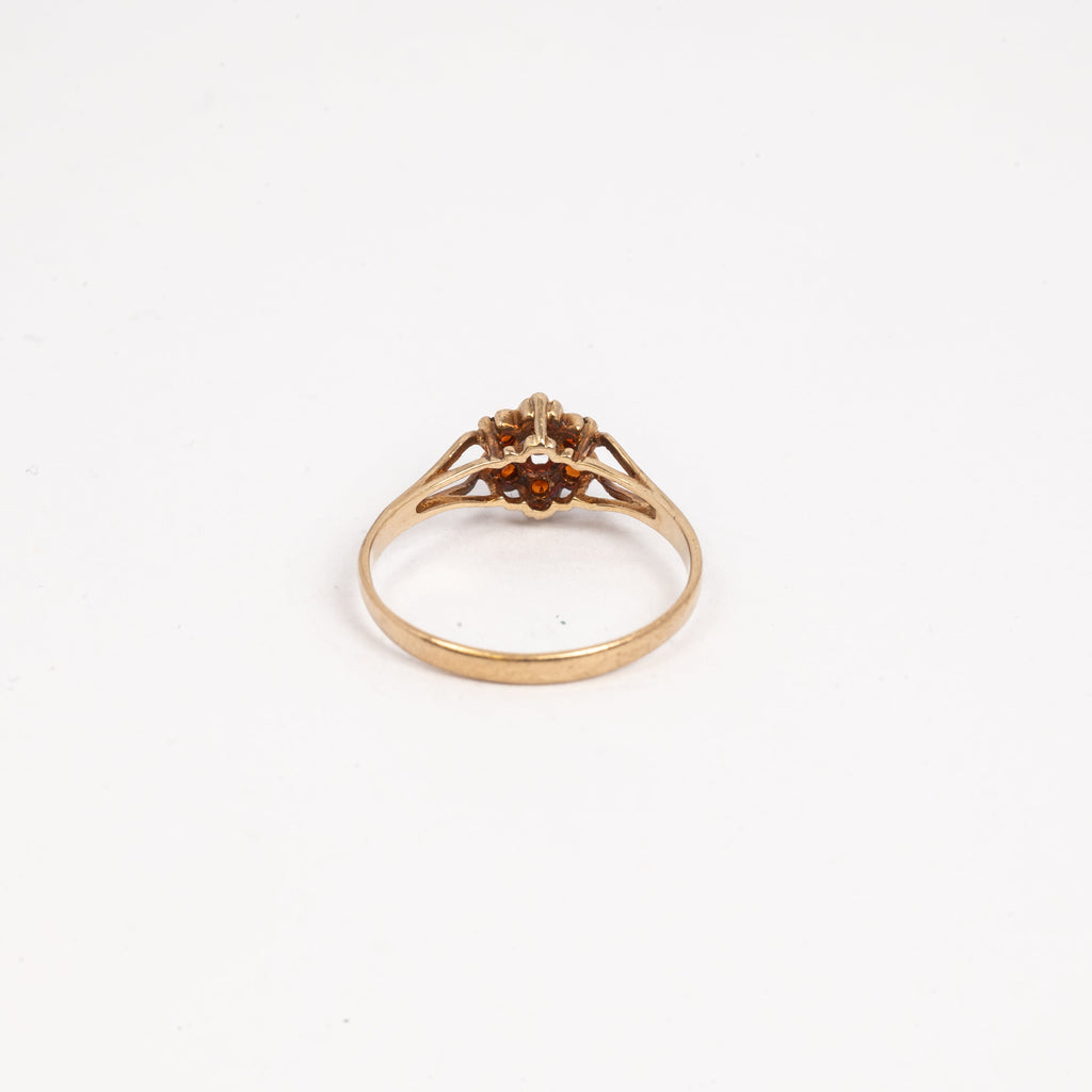Ladies Small Garnet Flower Ring